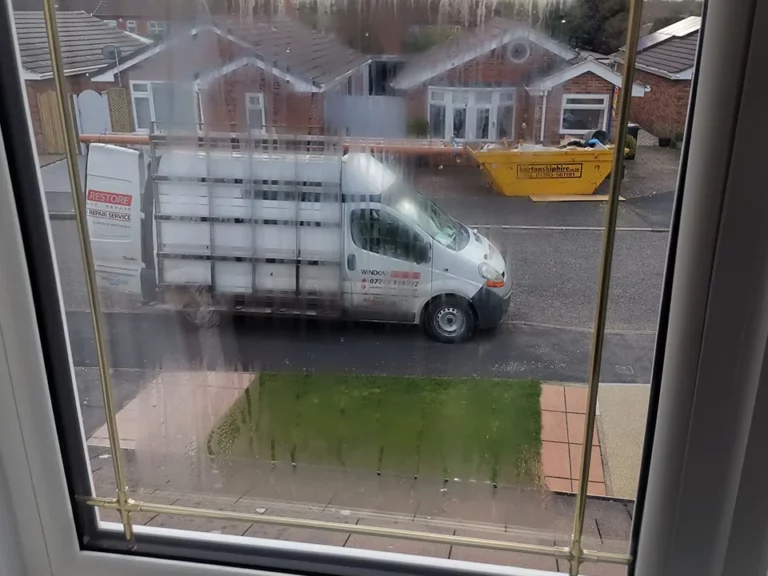 Before: a misted double-glazed window